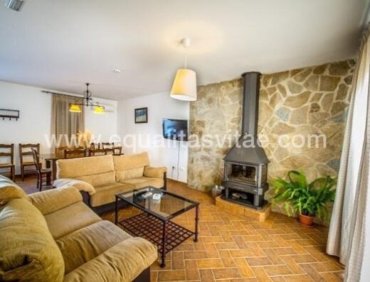 Zona salón de una de las casas adatadas del complejo turístico La Venta del Charco. Imagen facilitada por el establecimiento.