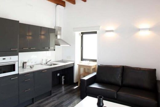 Zona cocina comedor de Suite familiar. Convent d´Ariany. Imagen de http://esconvent.org/