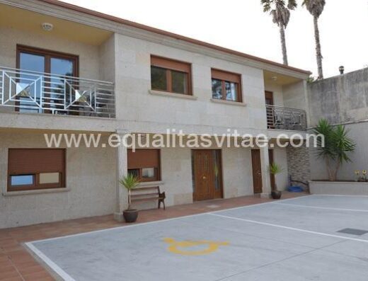 Plaza de aparcamiento reservada para PMR.